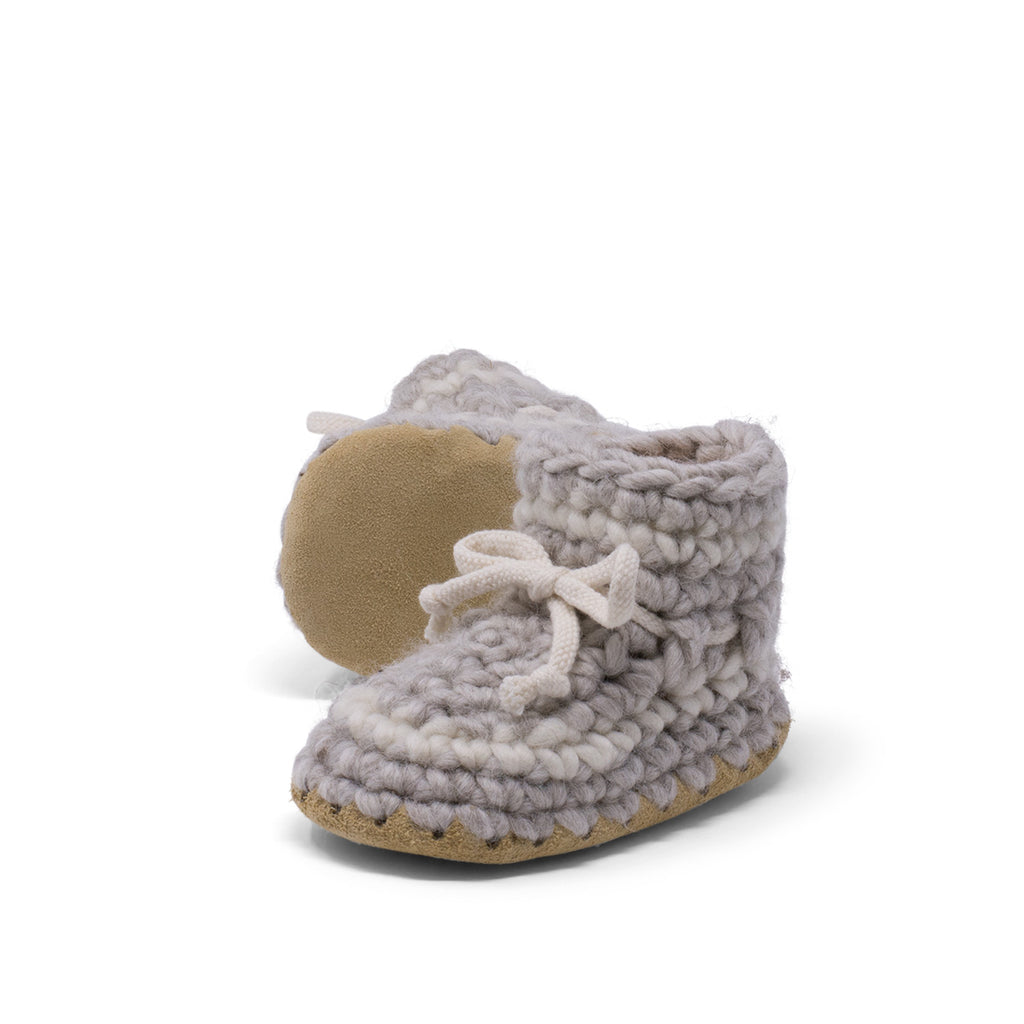 These wonderful hand-dyed wool crocheted slippers are made by a family business in Canada and are Elf-approved for their beauty, and eco-friendly production. Padraig slippers are an all-purpose slipper with the same great sheepskin soling. Innersoles are soft, genuine sheepskin, and outersoles feature non-slip suede. Wool will keep your foot cool and dry in warm weather, warm and dry in cold weather. Machine Washable, Sheepskin innersoles and non slip suede bottoms  Upper stretches to easily slip foot in.  
