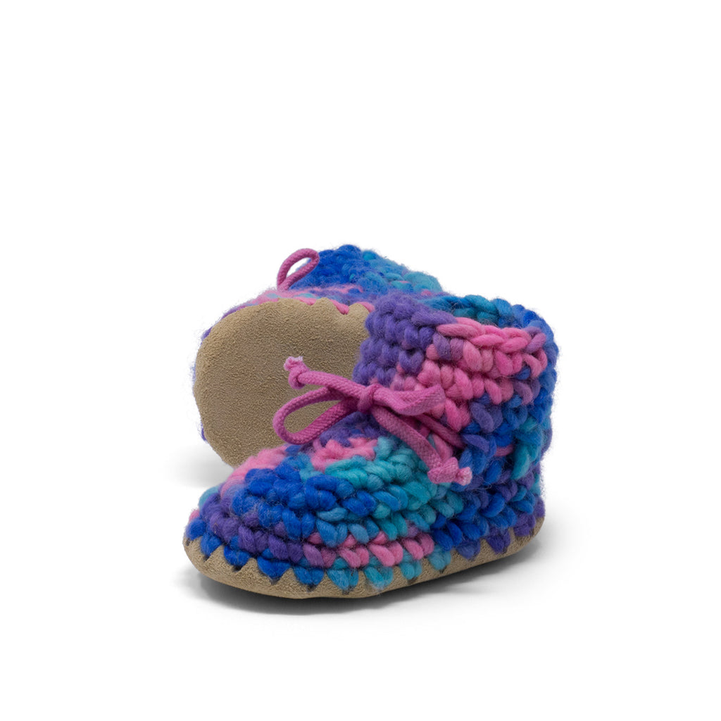 These wonderful hand-dyed wool crocheted slippers are made by a family business in Canada and are Elf-approved for their beauty, and eco-friendly production. Padraig slippers are an all-purpose slipper with the same great sheepskin soling. Innersoles are soft, genuine sheepskin, and outersoles feature non-slip suede. Wool will keep your foot cool and dry in warm weather, warm and dry in cold weather. Machine Washable, Sheepskin innersoles and non slip suede bottoms  Upper stretches to easily slip foot in.  