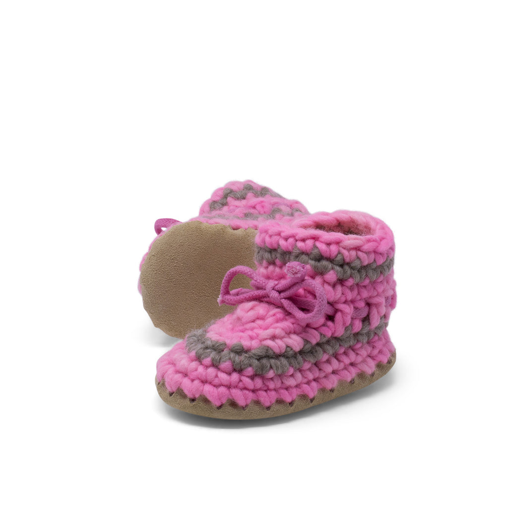 These wonderful hand-dyed wool crocheted slippers are made by a family business in Canada and are Elf-approved for their beauty, and eco-friendly production. Padraig slippers are an all-purpose slipper with the same great sheepskin soling. Innersoles are soft, genuine sheepskin, and outersoles feature non-slip suede. Wool will keep your foot cool and dry in warm weather, warm and dry in cold weather. Machine Washable, Sheepskin innersoles and non slip suede bottoms  Upper stretches to easily slip foot in.  