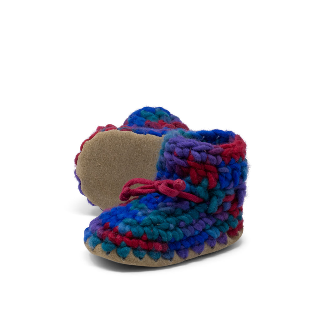 These wonderful hand-dyed wool crocheted slippers are made by a family business in Canada and are Elf-approved for their beauty, and eco-friendly production. Padraig slippers are an all-purpose slipper with the same great sheepskin soling. Innersoles are soft, genuine sheepskin, and outersoles feature non-slip suede. Wool will keep your foot cool and dry in warm weather, warm and dry in cold weather. Machine Washable, Sheepskin innersoles and non slip suede bottoms  Upper stretches to easily slip foot in.  