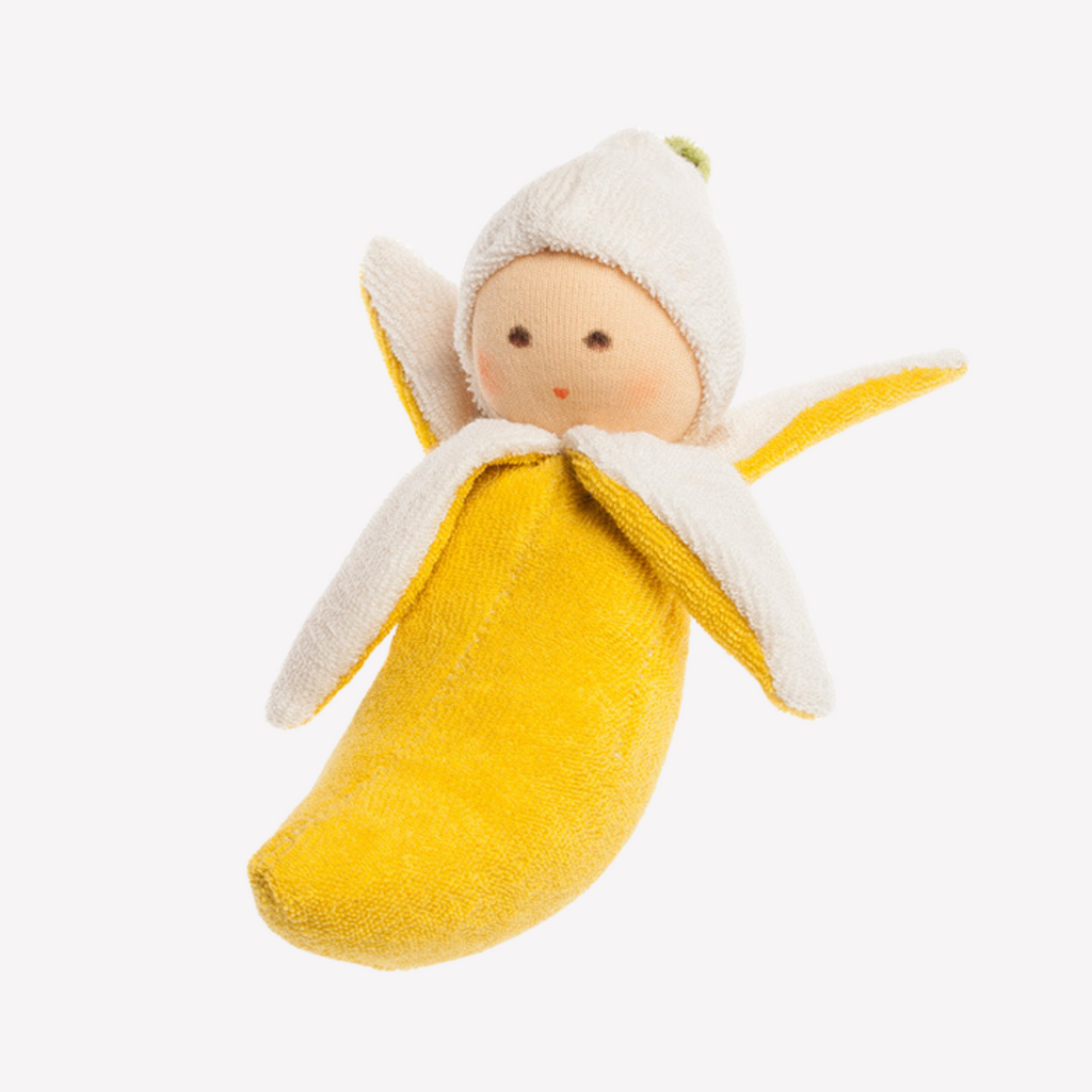 The cutest banana ever! Sweet and charming... fresh from the tree, this little rattle is perfect for baby. Lovingly handmade to be just right for little hands to grasp, hold and love. Wonderfully charming and adorable to look at, the subtle expression is calming and comforting. A friend to have along anytime or a adorable gift!

Organic Cotton and Organic Wool
