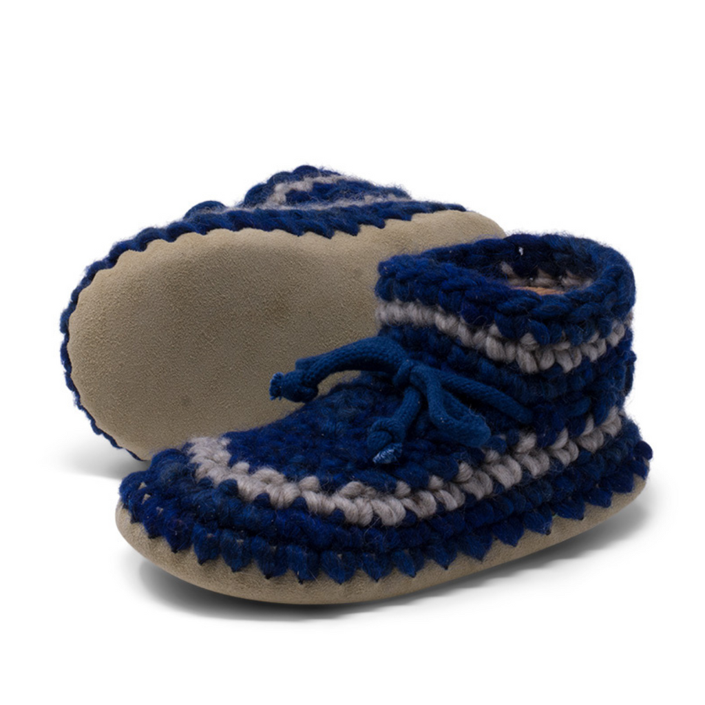 These wonderful hand-dyed wool crocheted slippers are made by a family business in Canada and are Elf-approved for their beauty, and eco-friendly production. Padraig slippers are an all-purpose slipper with the same great sheepskin soling. Innersoles are soft, genuine sheepskin, and outersoles feature non-slip suede. Wool will keep your foot cool and dry in warm weather, warm and dry in cold weather. Machine Washable, Sheepskin innersoles and non slip suede bottoms  Upper stretches to easily slip foot in.  
