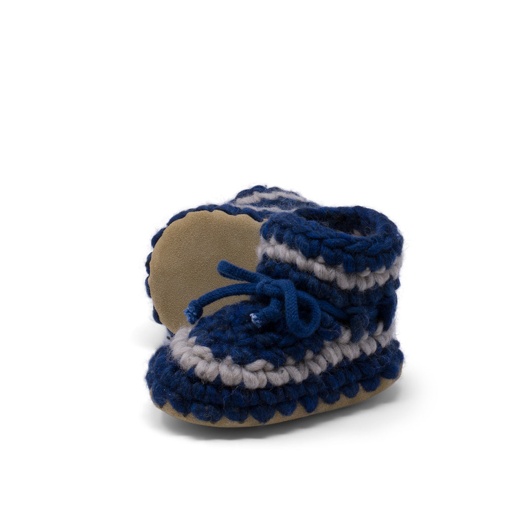 These wonderful hand-dyed wool crocheted slippers are made by a family business in Canada and are Elf-approved for their beauty, and eco-friendly production. Padraig slippers are an all-purpose slipper with the same great sheepskin soling. Innersoles are soft, genuine sheepskin, and outersoles feature non-slip suede. Wool will keep your foot cool and dry in warm weather, warm and dry in cold weather. Machine Washable, Sheepskin innersoles and non slip suede bottoms  Upper stretches to easily slip foot in.  