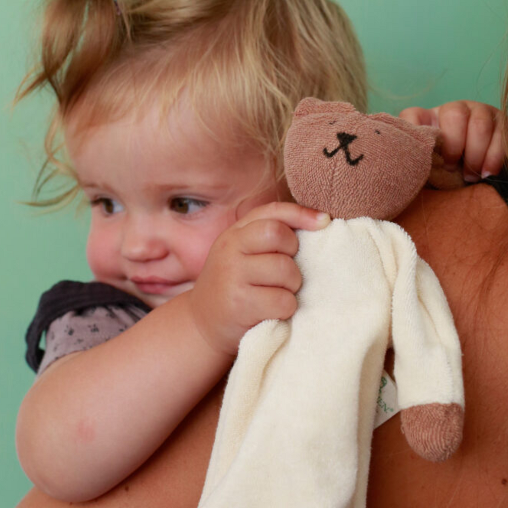 Sweet, soft, cuddly and perfect for baby. Lovingly handmade to be just right for tiny hands to grasp and hold.  The cute and happy bunny is a perfect soother and lovie for babies.  Soothing, cozy, wonderfully soft and adorable to look at. Great at home or on the go and a perfect gift!
Organic Cotton and Organic Wool

