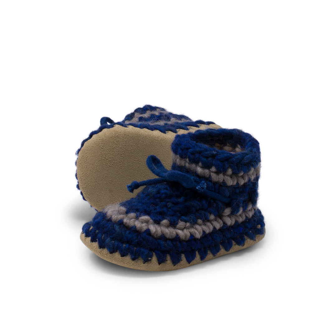 These wonderful hand-dyed wool crocheted slippers are made by a family business in Canada and are Elf-approved for their beauty, and eco-friendly production. Padraig slippers are an all-purpose slipper with the same great sheepskin soling. Innersoles are soft, genuine sheepskin, and outersoles feature non-slip suede. Wool will keep your foot cool and dry in warm weather, warm and dry in cold weather. Machine Washable, Sheepskin innersoles and non slip suede bottoms  Upper stretches to easily slip foot in.  