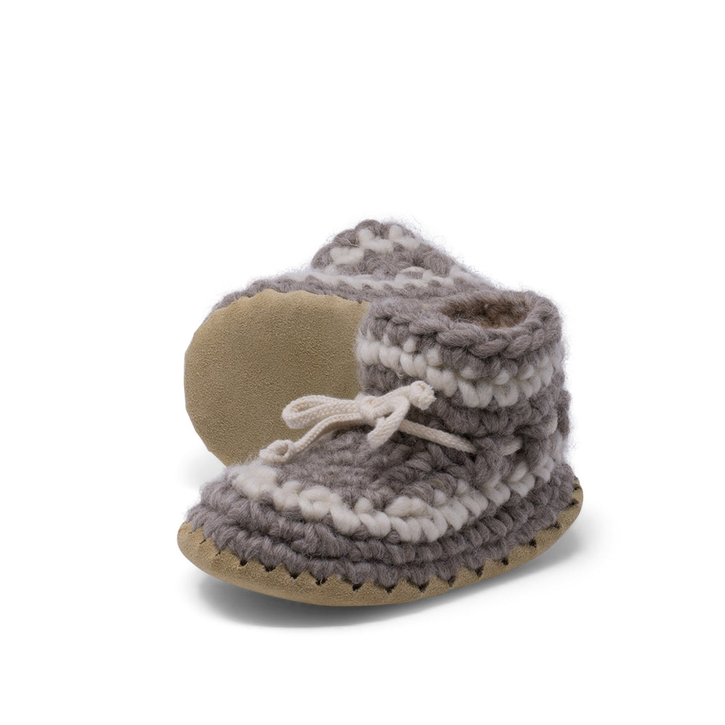 These wonderful hand-dyed wool crocheted slippers are made by a family business in Canada and are Elf-approved for their beauty, and eco-friendly production. Padraig slippers are an all-purpose slipper with the same great sheepskin soling. Innersoles are soft, genuine sheepskin, and outersoles feature non-slip suede. Wool will keep your foot cool and dry in warm weather, warm and dry in cold weather. Machine Washable, Sheepskin innersoles and non slip suede bottoms  Upper stretches to easily slip foot in.  