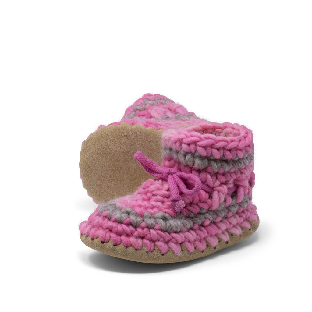 These wonderful hand-dyed wool crocheted slippers are made by a family business in Canada and are Elf-approved for their beauty, and eco-friendly production. Padraig slippers are an all-purpose slipper with the same great sheepskin soling. Innersoles are soft, genuine sheepskin, and outersoles feature non-slip suede. Wool will keep your foot cool and dry in warm weather, warm and dry in cold weather. Machine Washable, Sheepskin innersoles and non slip suede bottoms  Upper stretches to easily slip foot in.  