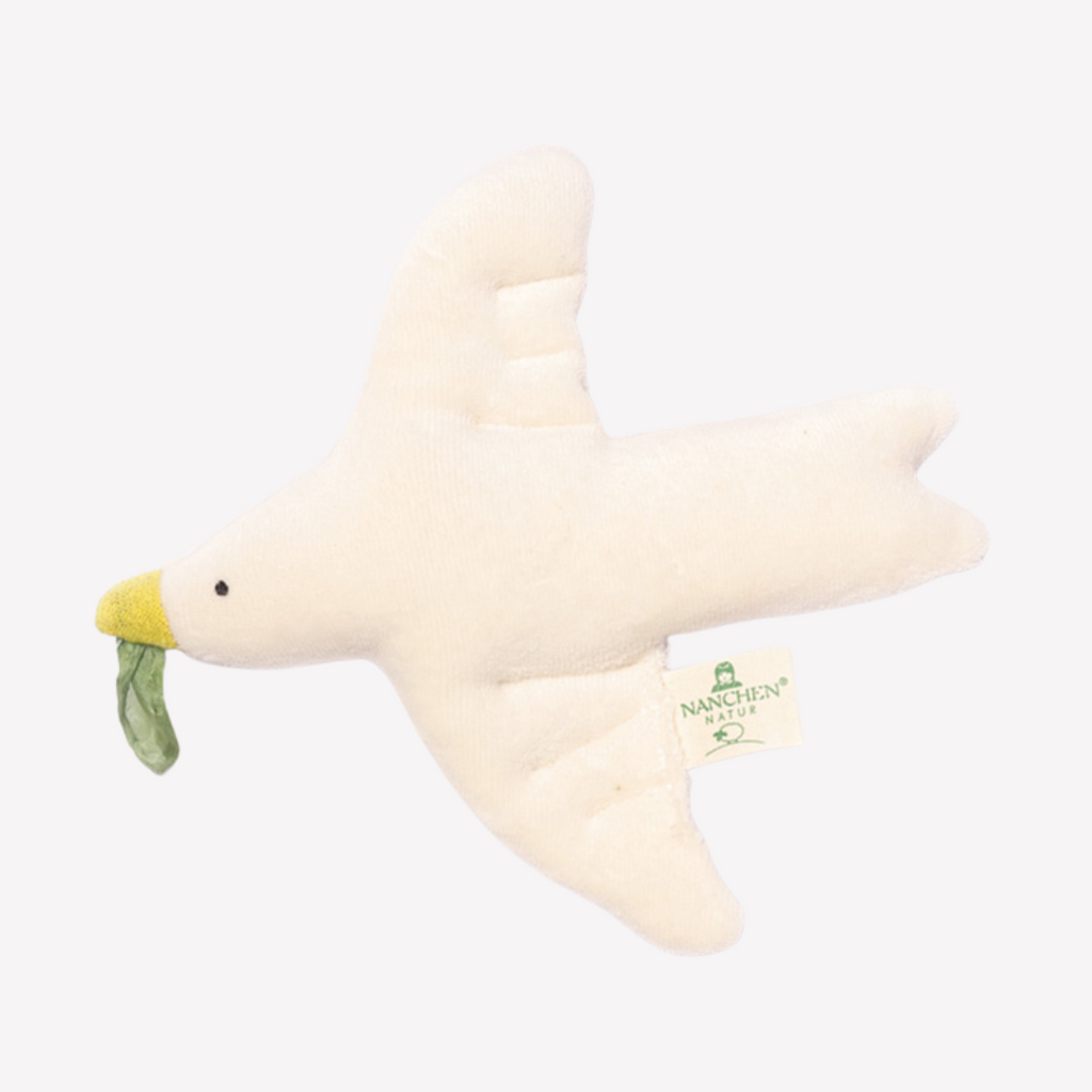 A peaceful and comforting dove to keep baby calm. Sweet, soft, cuddly and perfect for little ones. Lovingly handmade to be just right for tiny hands to grasp and hold. Soothing, cozy, wonderfully soft and adorable to look at. Nanchen Natur Organic Dove Rattle / Teether