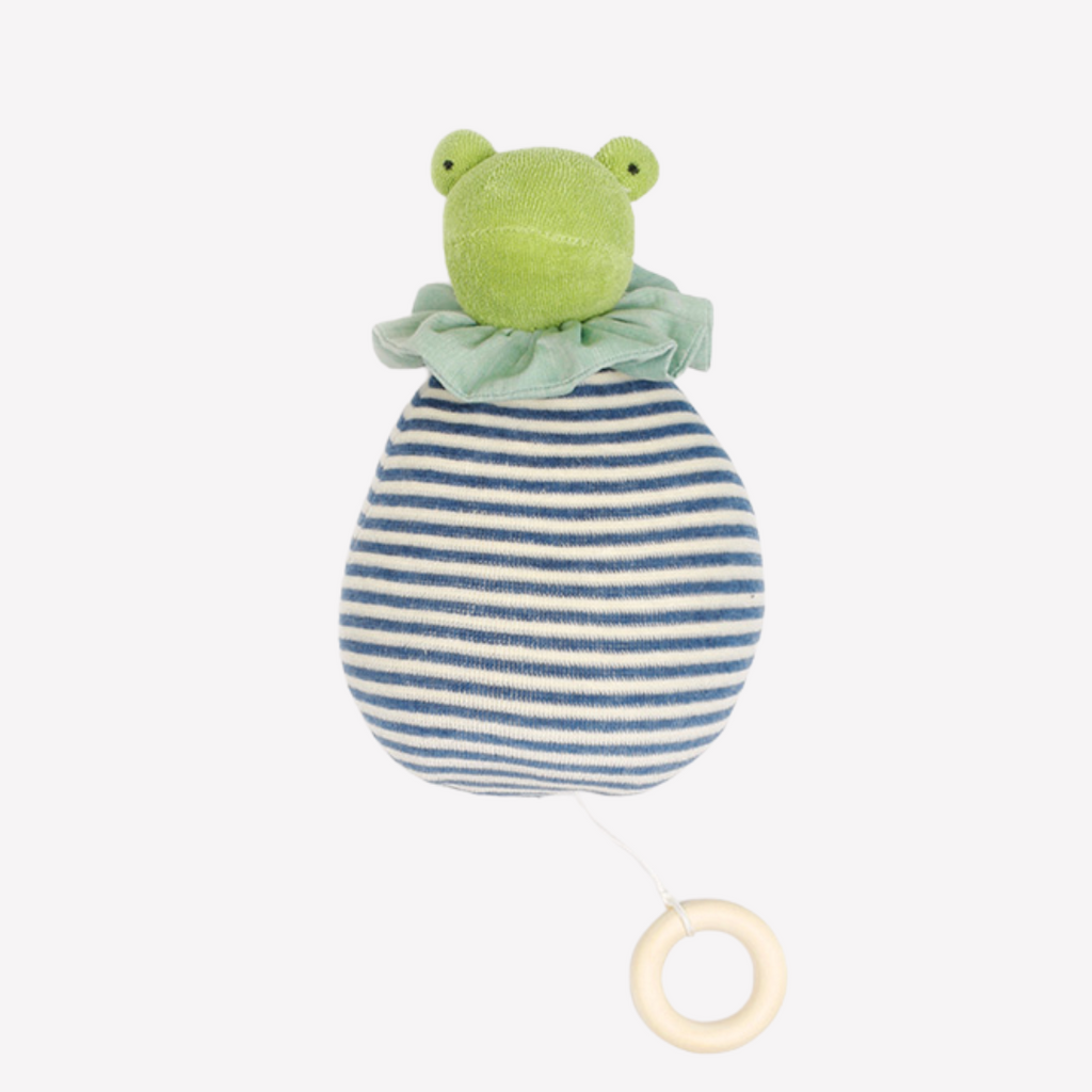 Frog-shaped toy with striped body and green head on a white background Frog King Nachen Natur Perfect for baby to drift of to fairytale dreamland with a sweet, soft, cuddly friend. Lovingly handmade to be just right for tiny hands to grasp and hold. Soothing, cozy, wonderfully soft and adorable to look at. Soft music will soothe and comfort. Great at home or on the go and a perfect gift! Each sold separately.