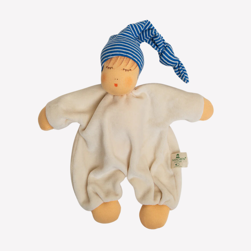 Nanchen Natur Sleeping Doll - Schlaf Schlafpupchen - Organic Cotton and Organic Wool 
Sweet, soft, cuddly and perfect for baby. Lovingly handmade to be just right for tiny hands to grasp and hold. Soothing, cozy, wonderfully soft and adorable to look at. Great at home or on the go and a perfect gift!