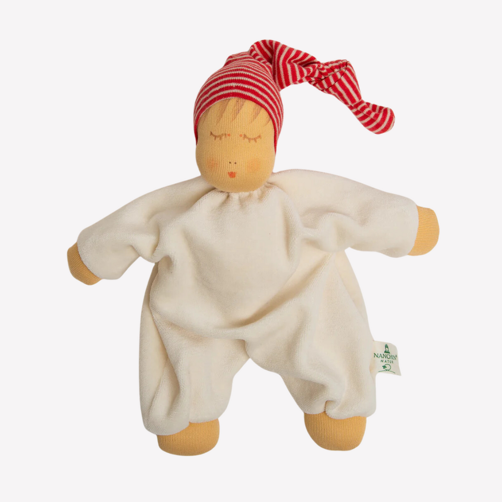 Nanchen Natur Sleeping Doll - Schlaf Schlafpupchen - Organic Cotton and Organic Wool 
Sweet, soft, cuddly and perfect for baby. Lovingly handmade to be just right for tiny hands to grasp and hold. Soothing, cozy, wonderfully soft and adorable to look at. Great at home or on the go and a perfect gift!