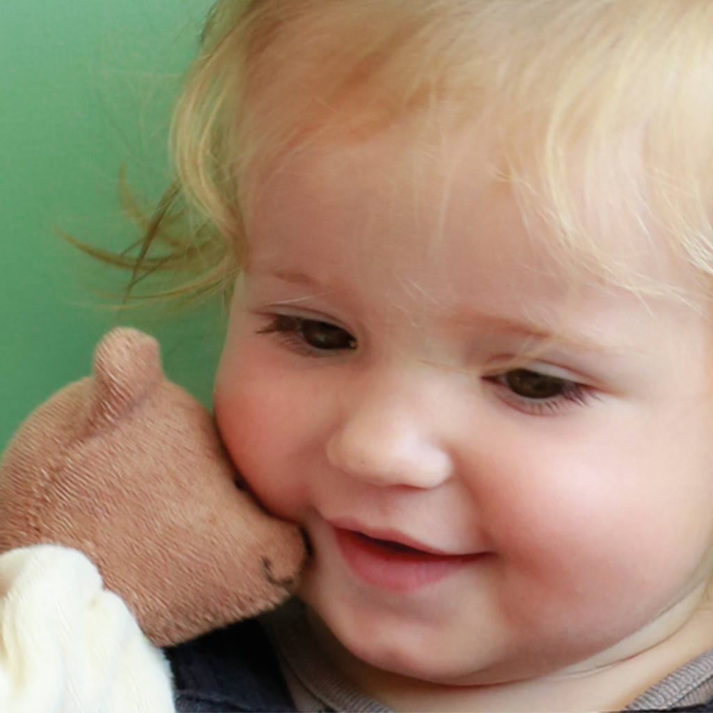 
Sweet, soft, cuddly and perfect soother/lovie for baby.  Cute, happy bear to keep baby smiling.   Lovingly handmade to be just right for tiny hands to grasp and hold. Soothing, cozy, wonderfully soft and adorable to look at. Great at home or on the go and a perfect gift!
Organic Cotton and Organic Wool

