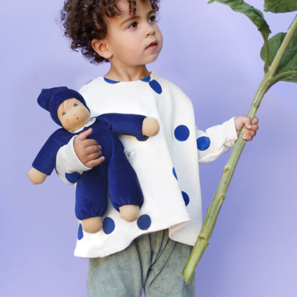 A lovely first doll for your baby to hold and snuggle. The subtle expression will charm and sooth your little one. Perfect for cuddles and a fun companion for tummy-time, this sweet doll will be a lifelong friend. 
Organic Cotton and Organic Wool
