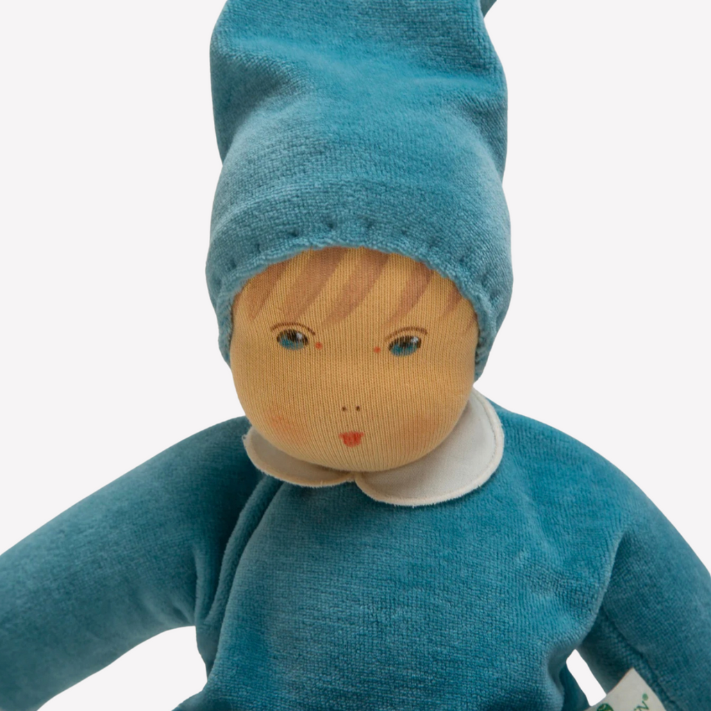 A lovely first doll for your baby to hold and snuggle. The subtle expression will charm and sooth your little one. Perfect for cuddles and a fun companion for tummy-time, this sweet doll will be a lifelong friend. 
Organic Cotton and Organic Wool
