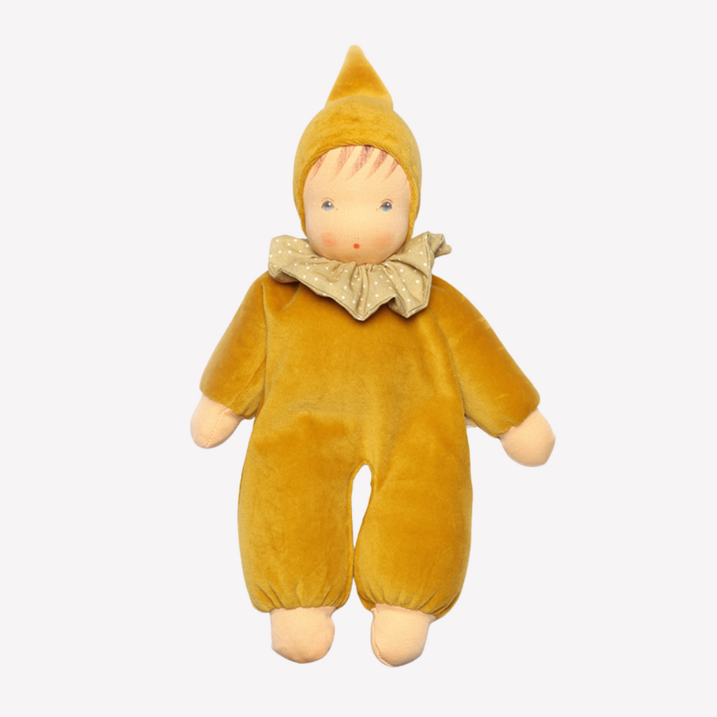 A lovely first doll for your baby to hold and snuggle. The subtle expression will charm and sooth your little one. Perfect for cuddles and a fun companion for tummy-time, this sweet doll will be a lifelong friend. 
Organic Cotton and Organic Wool
