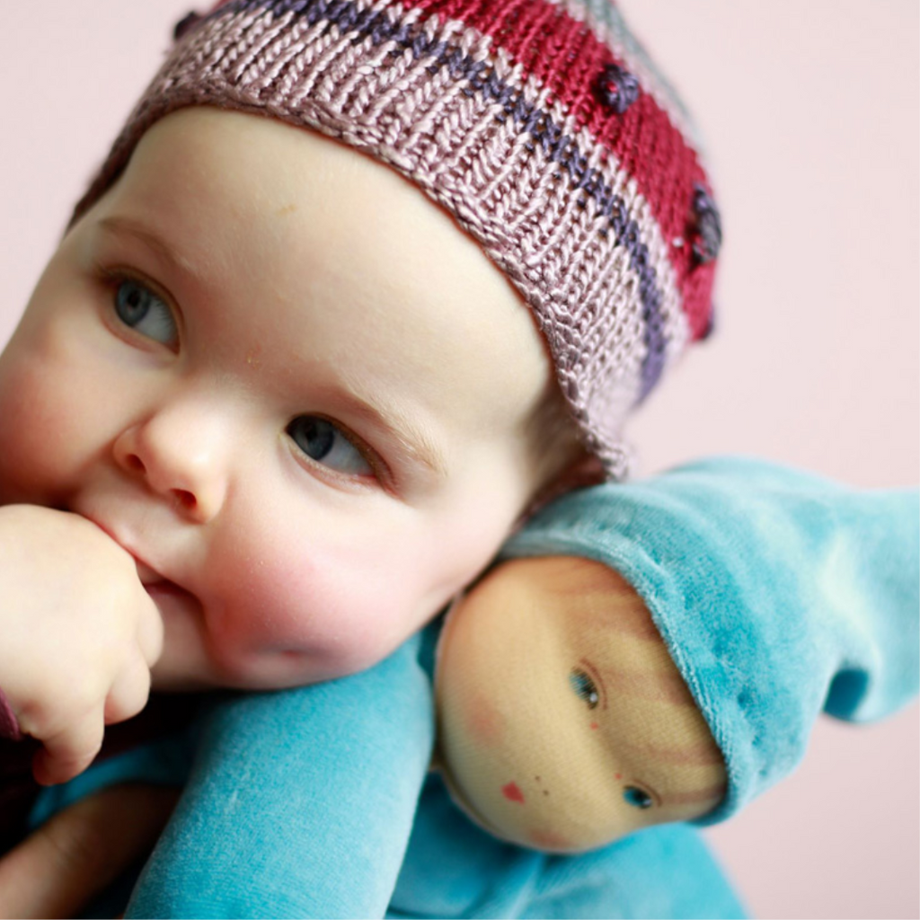 
A lovely first doll for your baby to hold and snuggle. The subtle expression will charm and sooth your little one. Perfect for cuddles and a fun companion for tummy-time, this sweet doll will be a lifelong friend. 
Organic Cotton and Organic Wool
