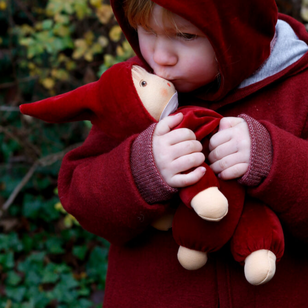 A lovely first doll for your baby to hold and snuggle. The subtle expression will charm and sooth your little one. Perfect for cuddles and a fun companion for tummy-time, this sweet doll will be a lifelong friend. 
Organic Cotton and Organic Wool