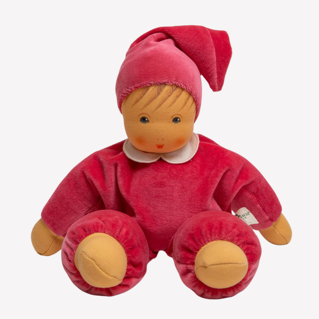 A lovely first doll for your baby to hold and snuggle. The subtle expression will charm and sooth your little one. Perfect for cuddles and a fun companion for tummy-time, this sweet doll will be a lifelong friend. 
Organic Cotton and Organic Wool