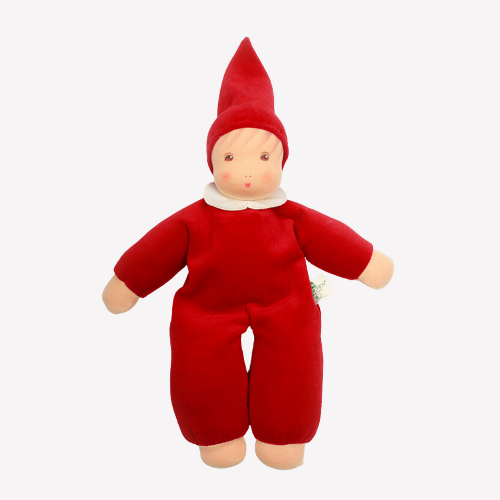 A lovely first doll for your baby to hold and snuggle. The subtle expression will charm and sooth your little one. Perfect for cuddles and a fun companion for tummy-time, this sweet doll will be a lifelong friend. 
Organic Cotton and Organic Wool