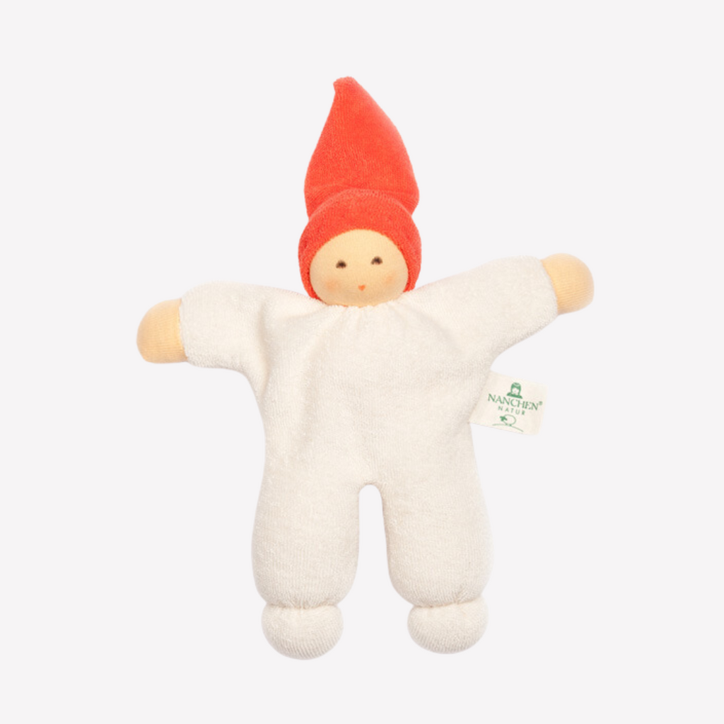 With a sweet smile, this adorable and incredibly soft doll will quickly become your little one's best friend. Soft to cuddle, sweet and friendly, a perfect companion for naps, car rides and perhaps a stroll in the park.   
Organic Cotton and Organic Wool
