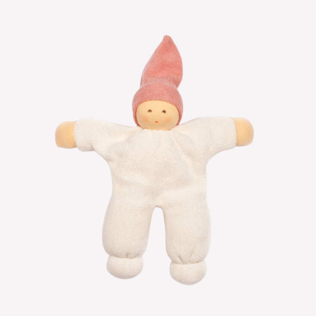 With a sweet smile, this adorable and incredibly soft doll will quickly become your little one's best friend. Soft to cuddle, sweet and friendly, a perfect companion for naps, car rides and perhaps a stroll in the park.   
Organic Cotton and Organic Wool
