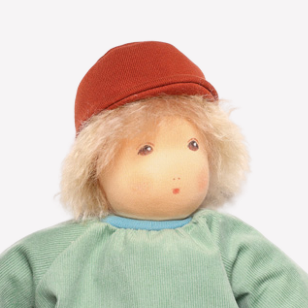 Children love to imagine and create stories and this beautiful doll is a just right companion to help play out those ideas, perhaps a tea party scene or a friend along on a walk. The world of imagination awaits. Wonderfully charming and adorable to look at, the subtle expression is calming and comforting. At the end of the day this amazing doll is the perfect bedtime listener and cozy pal. Nachen Natur