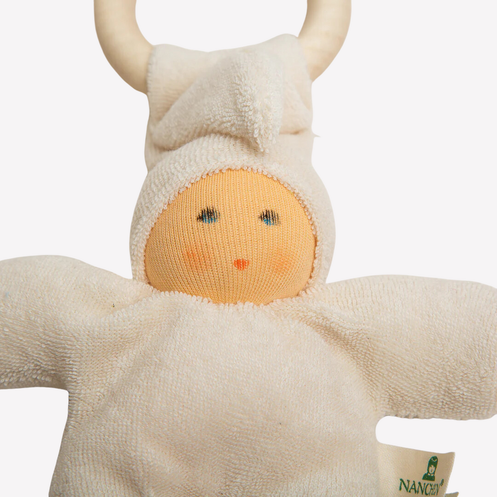 Sweet, soft, cuddly and perfect for baby. Lovingly handmade to be just right for tiny hands to grasp and hold. The wood ring is smooth and soothing on baby's gums. Wonderfully soft and adorable to look at. Great at home or on the go and a perfect gift! Each sold separately.

Organic Cotton and Organic Wool
