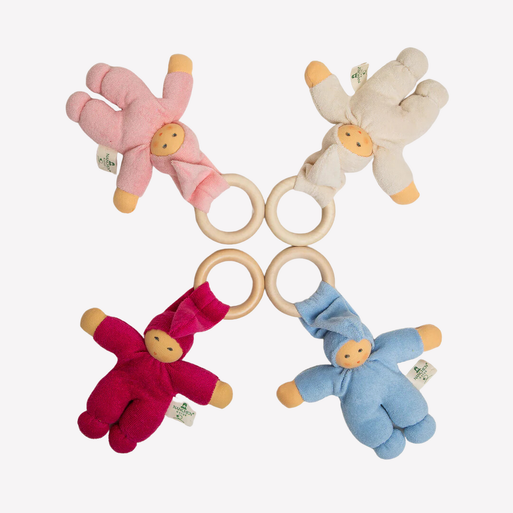 Sweet, soft, cuddly and perfect for baby. Lovingly handmade to be just right for tiny hands to grasp and hold. The wood ring is smooth and soothing on baby's gums. Wonderfully soft and adorable to look at. Great at home or on the go and a perfect gift! Each sold separately.

Organic Cotton and Organic Wool
