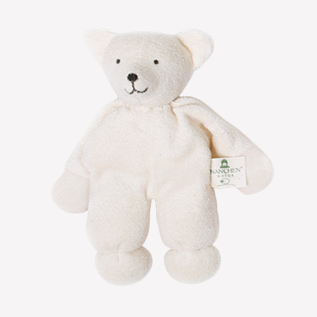This bear is as adorably classic as it is sweet, cuddly and perfect for baby. Lovingly handmade to be just right for tiny hands to grasp and hold. Soothing, cozy, wonderfully soft and adorable to look at. 

Soother and Rattle - Natural and Organic - Nanchen Natur.

Infant will use as a teether but also a beautiful natural toy