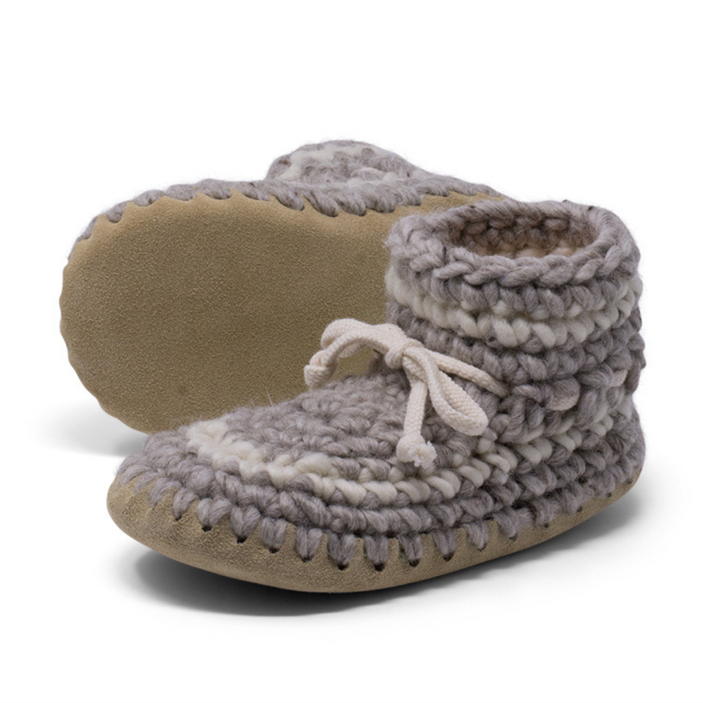 These wonderful hand-dyed wool crocheted slippers are made by a family business in Canada and are Elf-approved for their beauty, and eco-friendly production. Padraig slippers are an all-purpose slipper with the same great sheepskin soling. Innersoles are soft, genuine sheepskin, and outersoles feature non-slip suede. Wool will keep your foot cool and dry in warm weather, warm and dry in cold weather. Machine Washable, Sheepskin innersoles and non slip suede bottoms  Upper stretches to easily slip foot in.  
