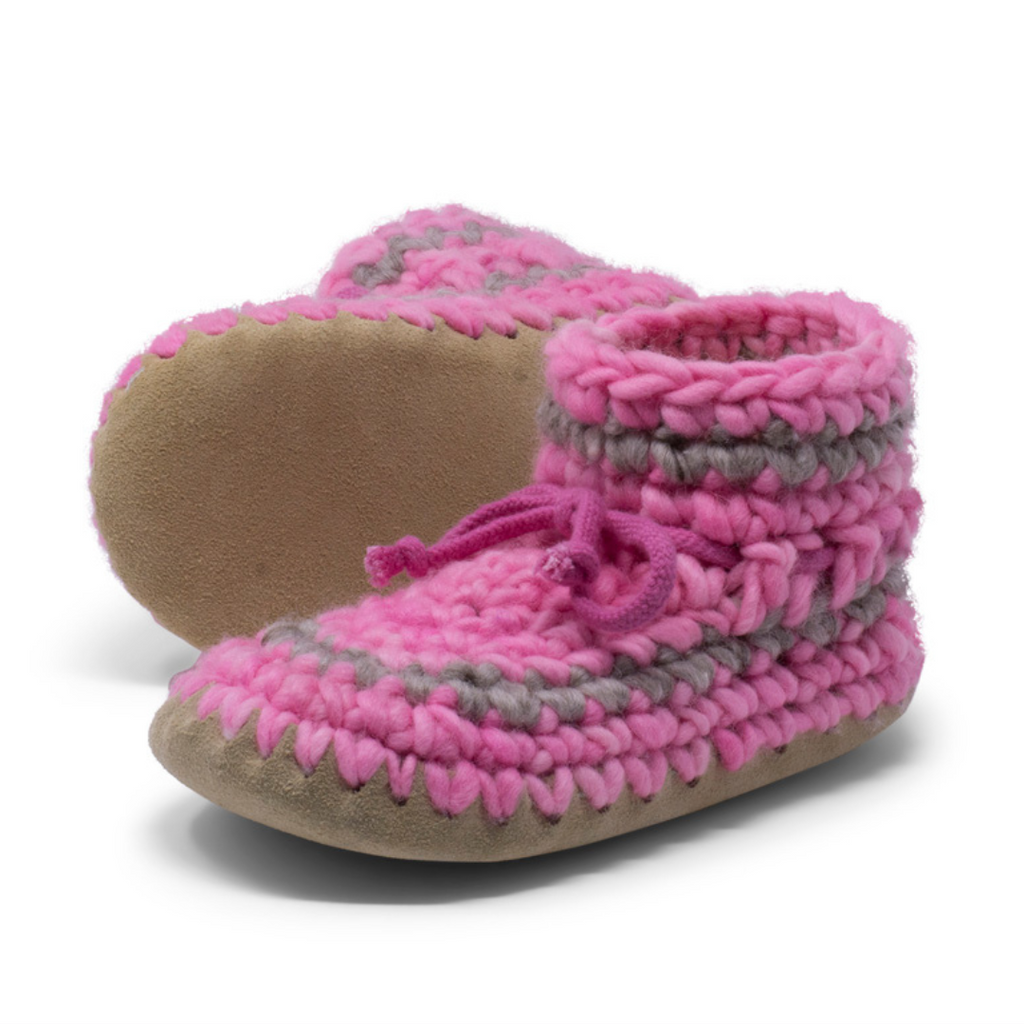 These wonderful hand-dyed wool crocheted slippers are made by a family business in Canada and are Elf-approved for their beauty, and eco-friendly production. Padraig slippers are an all-purpose slipper with the same great sheepskin soling. Innersoles are soft, genuine sheepskin, and outersoles feature non-slip suede. Wool will keep your foot cool and dry in warm weather, warm and dry in cold weather. Machine Washable, Sheepskin innersoles and non slip suede bottoms  Upper stretches to easily slip foot in.  