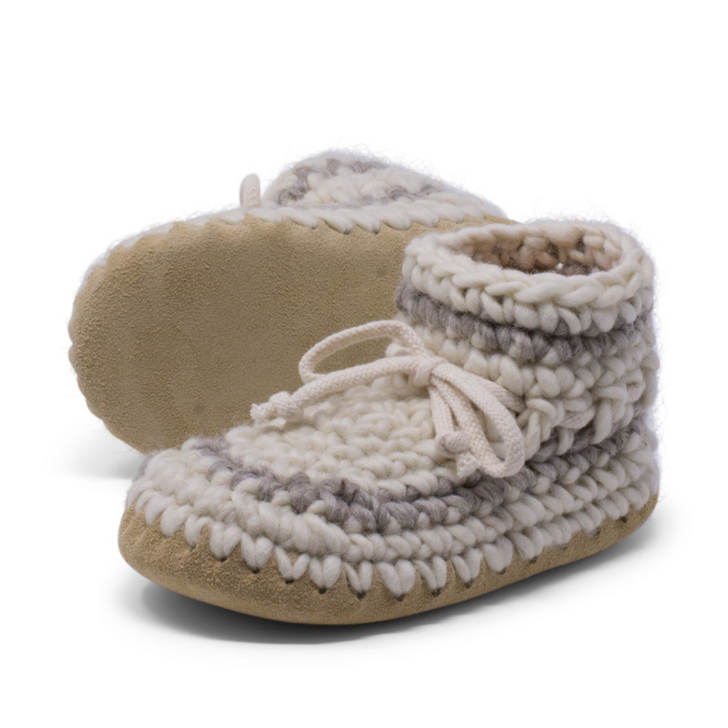 These wonderful hand-dyed wool crocheted slippers are made by a family business in Canada and are Elf-approved for their beauty, and eco-friendly production. Padraig slippers are an all-purpose slipper with the same great sheepskin soling. Innersoles are soft, genuine sheepskin, and outersoles feature non-slip suede. Wool will keep your foot cool and dry in warm weather, warm and dry in cold weather. Machine Washable, Sheepskin innersoles and non slip suede bottoms  Upper stretches to easily slip foot in.  